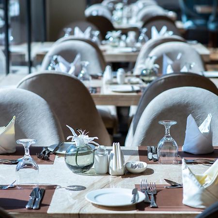 Vittori Palace Hotel And Residences Riyadh Luaran gambar A table set for fine dining