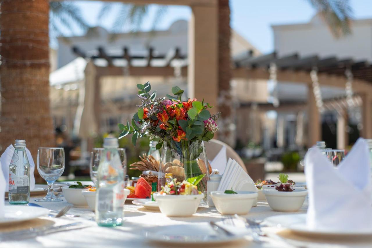 Vittori Palace Hotel And Residences Riyadh Luaran gambar A table set for a meal