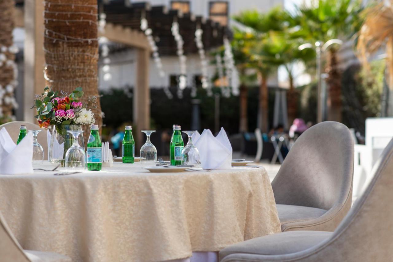 Vittori Palace Hotel And Residences Riyadh Luaran gambar A table set for a meal