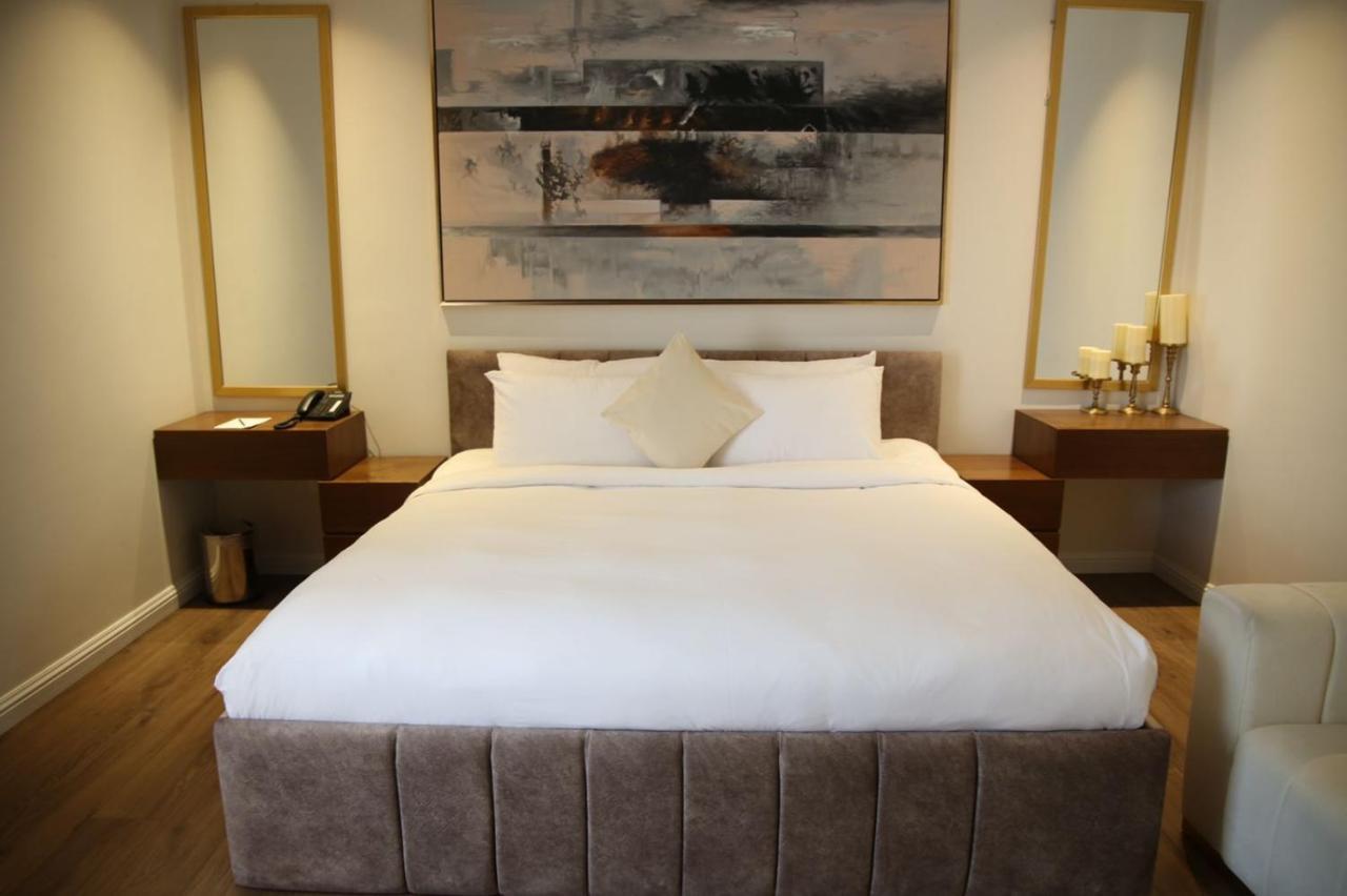 Vittori Palace Hotel And Residences Riyadh Luaran gambar A bedroom at the hotel